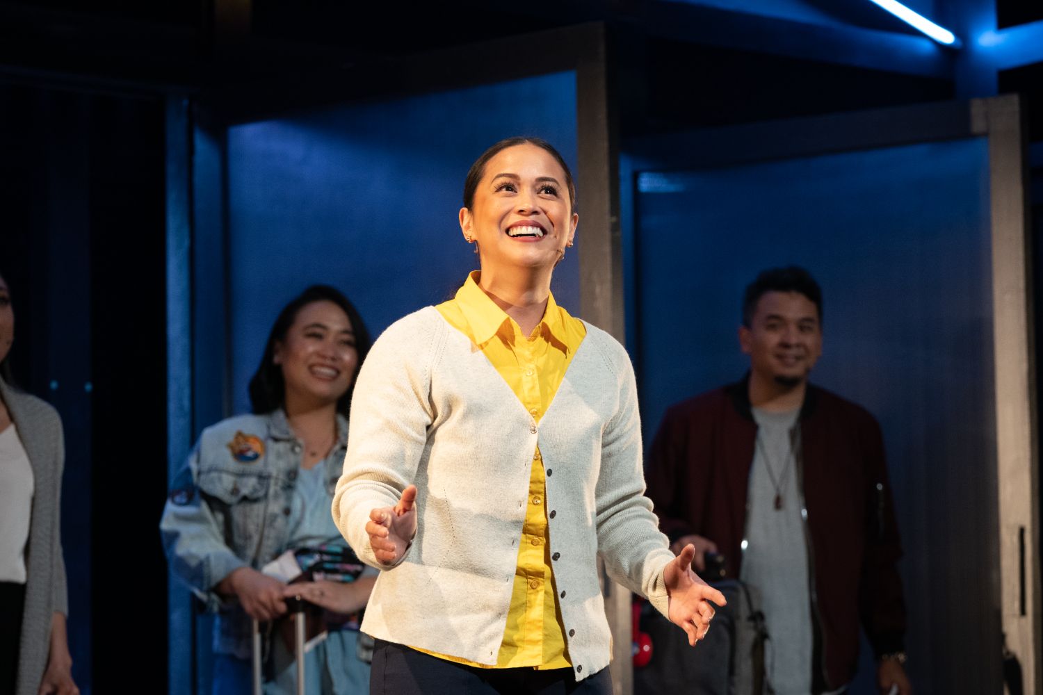 PHOTO: Jenny Graham | The South Pasadenan | Zandi De Jesus (center) as Jemmalyn performs “Things I Don’t Know Yet” with the cast of On This Side of the World at East West Players. 