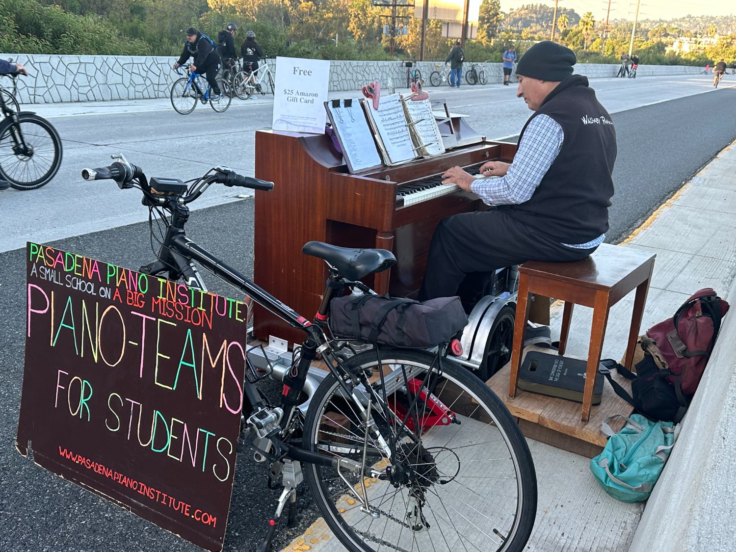 PHOTO: Bill Glazier | The South Pasadenan | Pianist David Cutter of the Piano Institute of Pasadena plays his piano on the 110 freeway during the ArroyoFest 2023.