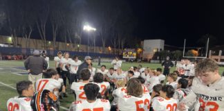 PHOTO: Anthony Chan | SPHS Tigers Football | coach Jeff Chi talking to his team after 35-21 CIF quarterfinal victory over St. Margaret’s Friday night.