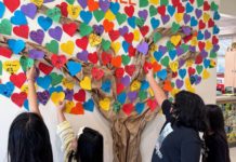 PHOTO: provided by Marengo Elementary School | The South Pasadenan | Marengo Elementary students add their acts of kindness to the school’s kindness tree in the main office.