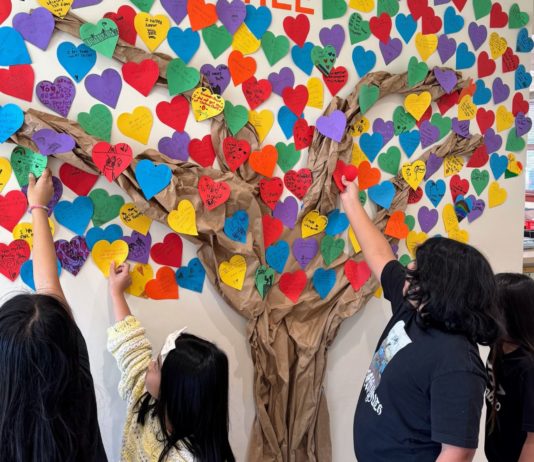 PHOTO: provided by Marengo Elementary School | The South Pasadenan | Marengo Elementary students add their acts of kindness to the school’s kindness tree in the main office.