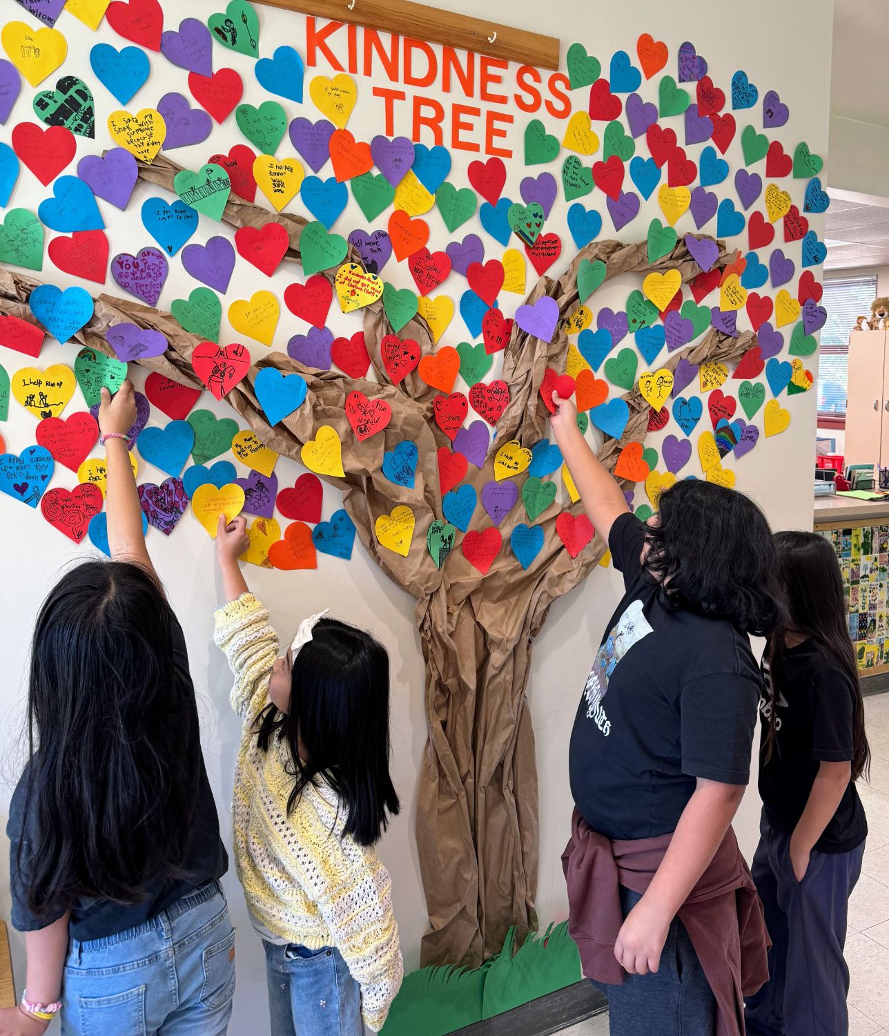 PHOTO: provided by Marengo Elementary School | The South Pasadenan | Marengo Elementary students add their acts of kindness to the school’s kindness tree in the main office. 