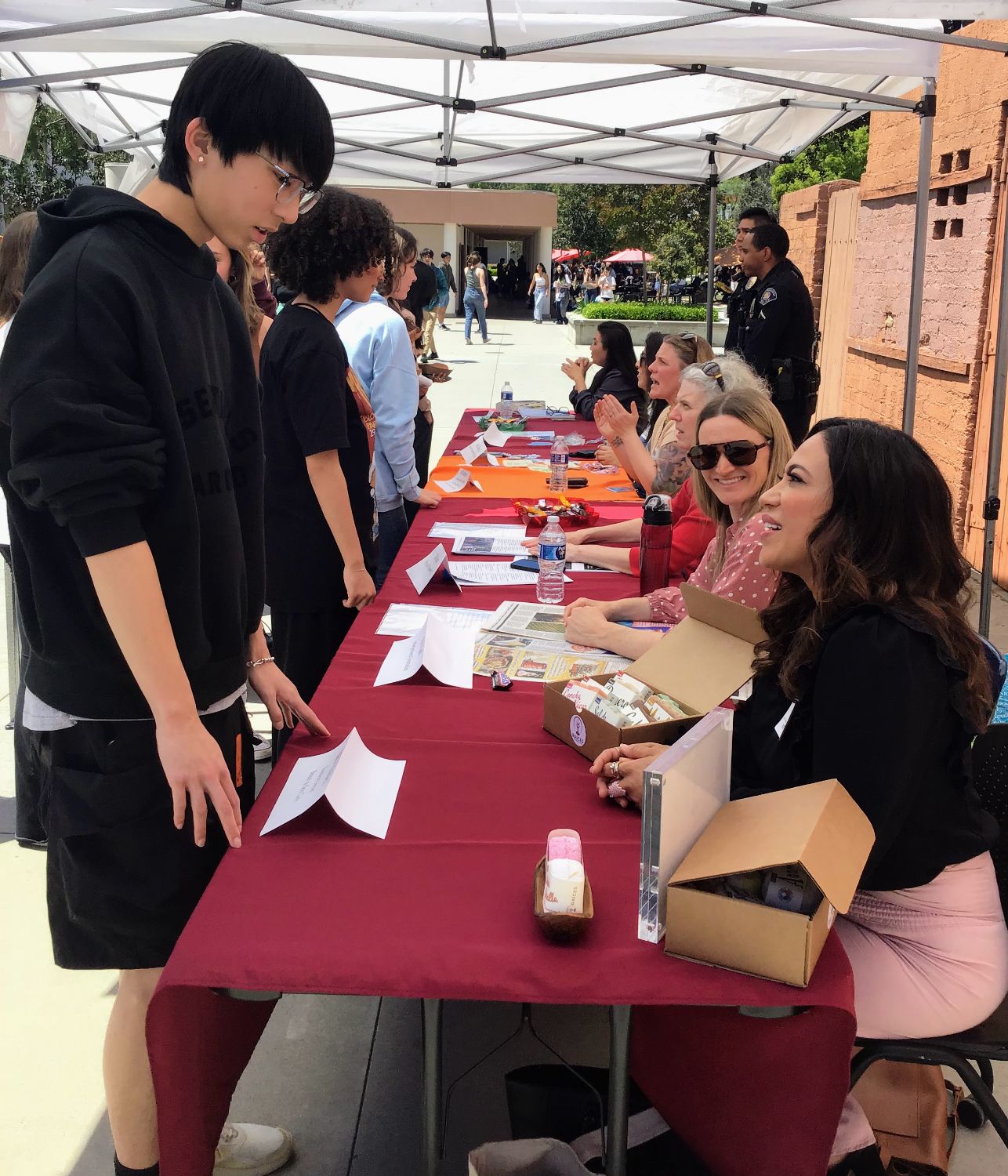 PHOTO: provided by SPUSD | The South Pasadenan | Maribel Valadez (left), entrepreneur and owner of Raices in South Pasadena, shares information about her job with students during the 2024 Career Fair at SPHS.
