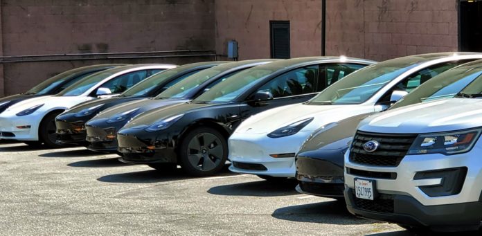 PHOTO: TESLA - Tina Kistinger | The South Pasadenan News | Newly delivered Tesla Model 3's at the South Pasadena Police Station. The next steps include converting the vehicles into fully operational police units, and installing the charging stations.