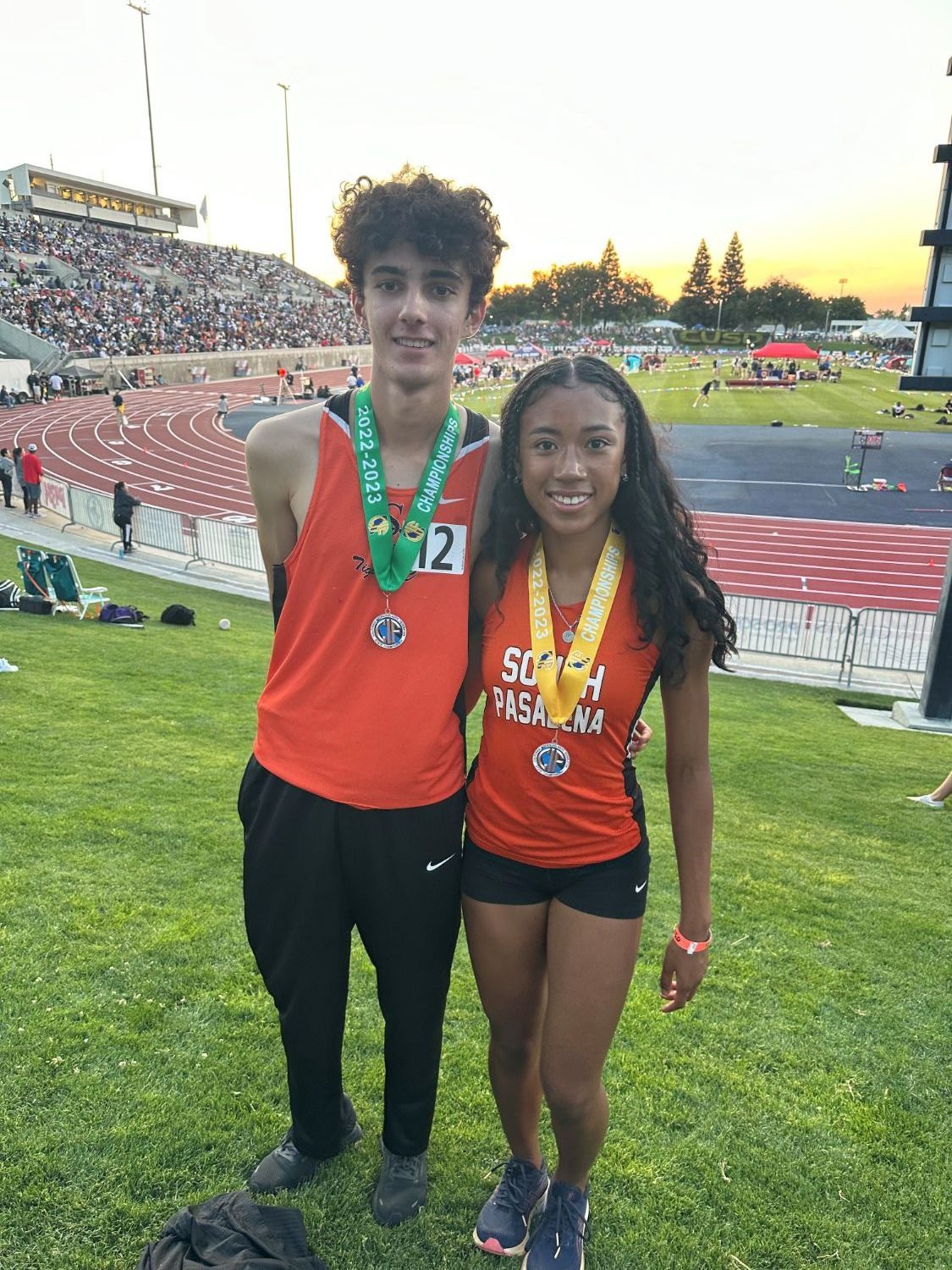 PHOTO: Mike Parkinson | The South Pasadenan | SPHS Track and Field athletes Mia Holden and Keeran Murray after receiving their medals at the CIF State Championship 2023.
