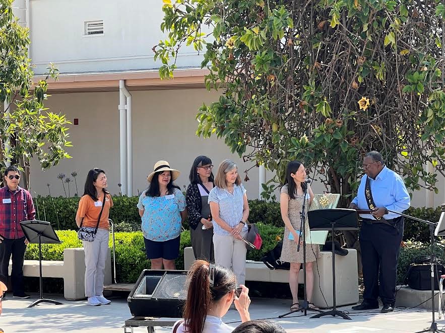 PHOTO: provided by Lauren Black | The South Pasadenan | Many in the crowd came up to say hello to the departing Howard Crawford, far right, who is retiring after 34 years as teacher and band director at South Pasadena High.
