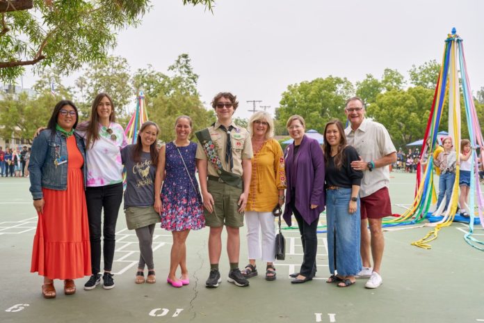 PHOTO: Eric Staudenmaier | South Pasadenan | Otto and his former teachers (and past principals) still at Marengo, L-R: Tiffany Lewis, Katherine Perry, Valerie Omine, Rachael Wong, Otto Staudenmaier, Kim Sinclair, Patricia Cheadle, Principal Noelle Fong, Ron Aschieris.