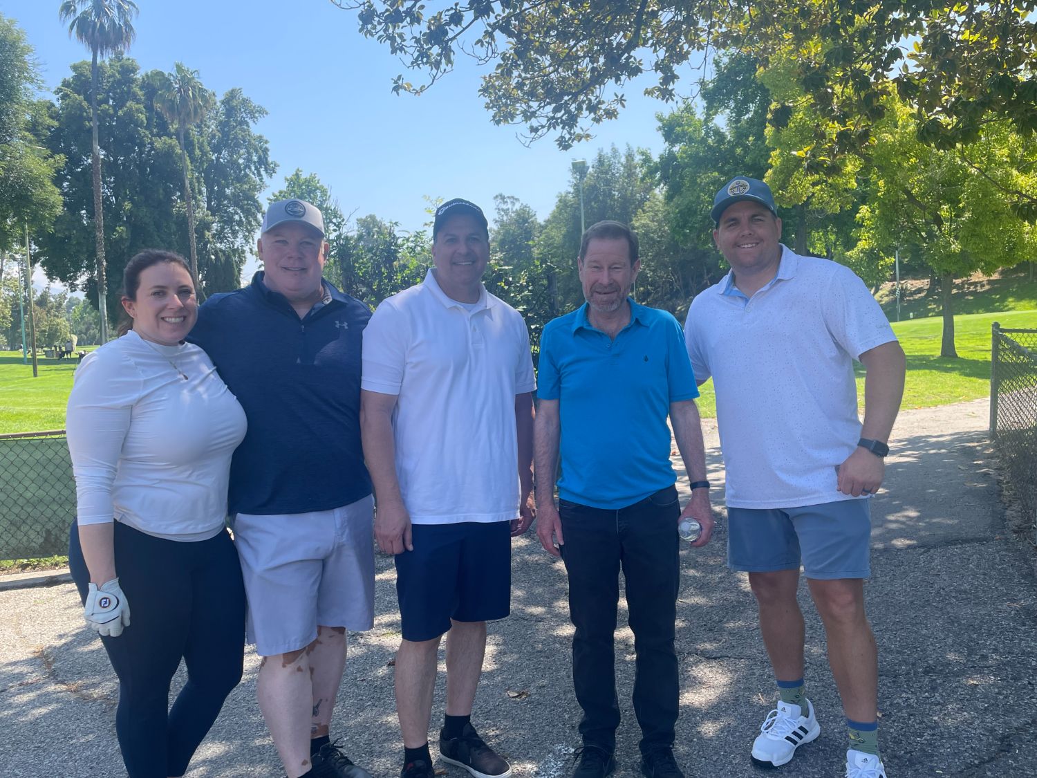 PHOTO: Sally Kilby | The South Pasadenan | Mayor Jon Primuth (second from right) poses for a photo with South Pasadena Police Department golf team members (L-R) Allison Wehrle, management analyst; Bob Bartl, sergeant, retired; Brian Solinsky, chief; and Tyler Borrello, corporal.