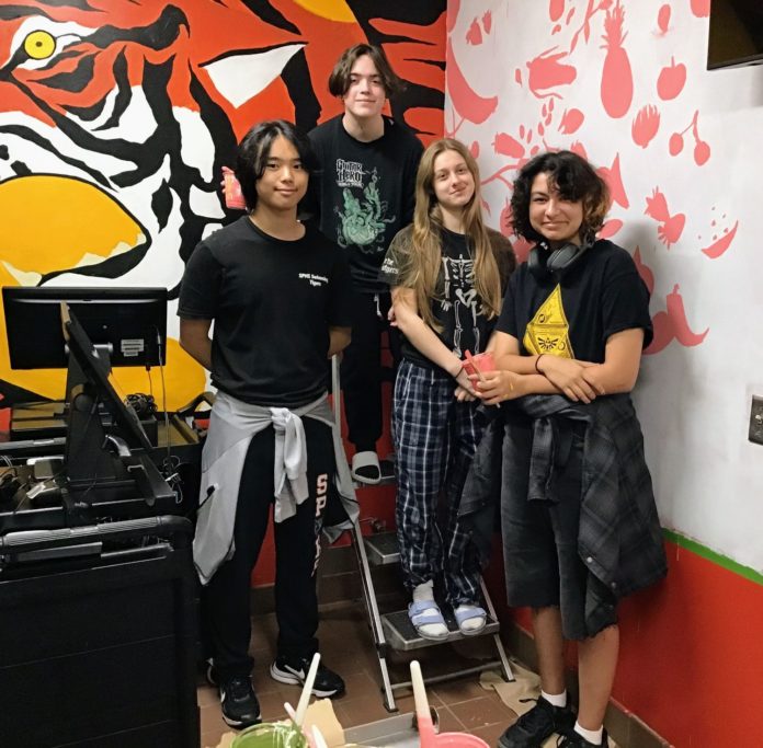 PHOTO: SPUSD | The South Pasadenan | SPHS Art students from left to right: Hanniel Park, Jayel Bright, Eloise Wilson, and Icarus Foerstner lend a hand on a summer improvement project in the high school cafeteria.