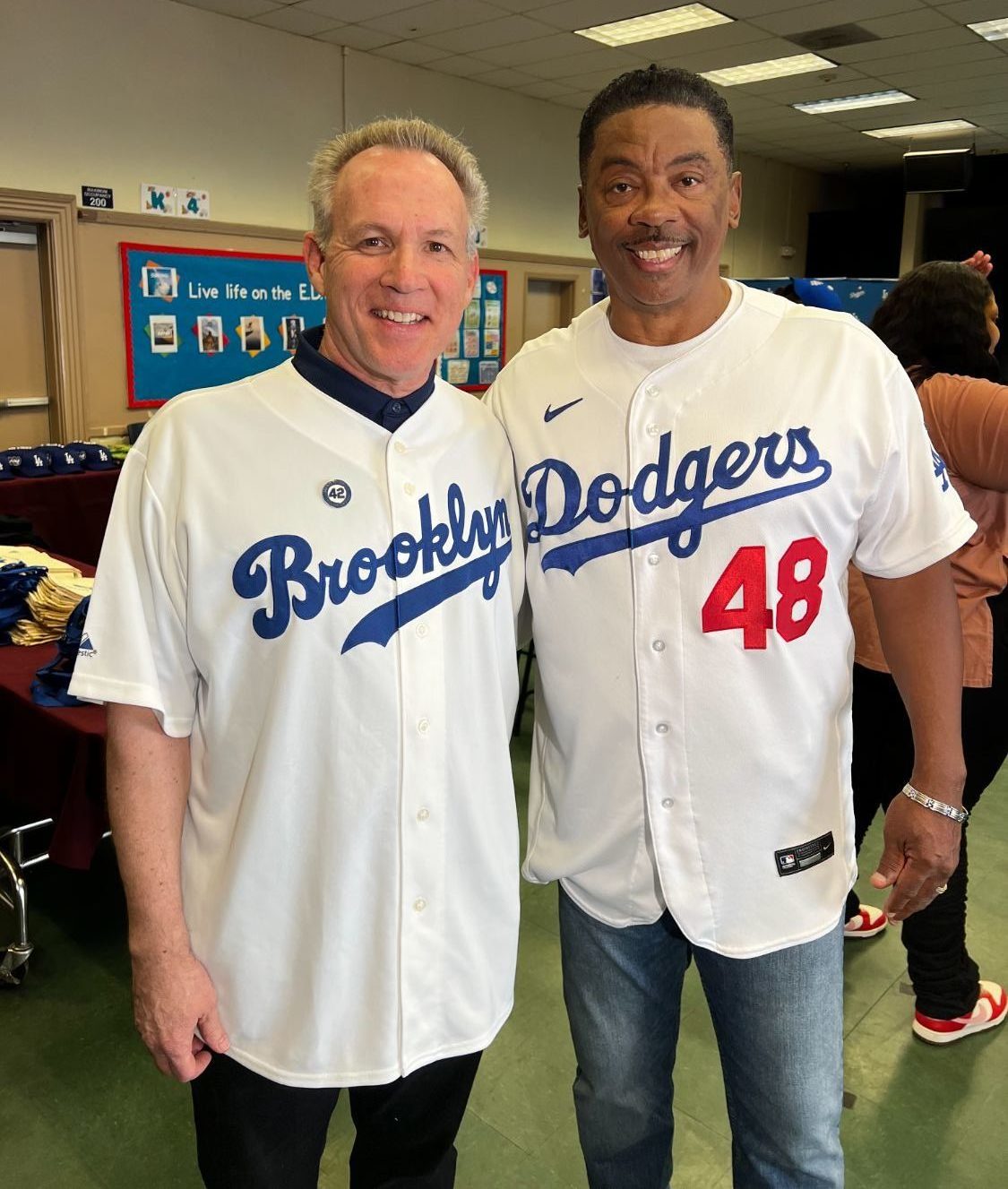 P)HOTO: provided by Mark Langill | The South Pasadenan | Not only does Mark Langill, left, know plenty about the Los Angeles Dodgers, but also a whole lot about Brooklyn, the club’s original home. Above, he’s joined by former Dodger pitcher Dennis Powell at Jackie Robinson’s former elementary school in Pasadena. It celebrated Jackie Robinson Day in the Major Leagues on the 77th anniversary of Robinson’s debut with the Brooklyn Dodgers.