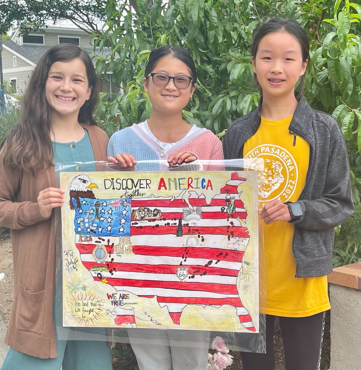 PHOTO: SPARC | The South Pasadenan | 4th of July poster contest finalists Marisola Barba, Seraph Wu, and Cleo Zhang with their entry "Discover America Together".