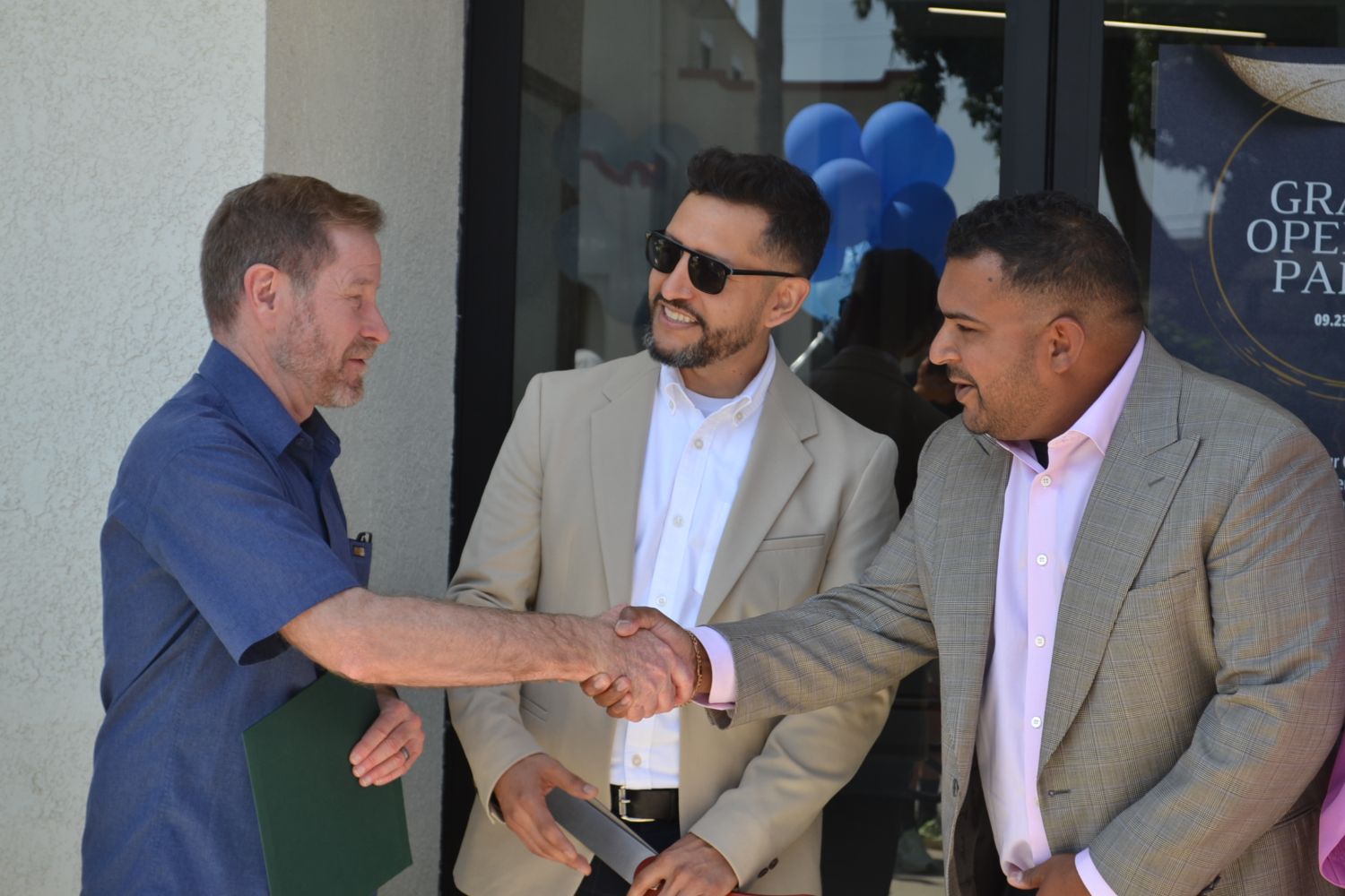PHOTO: Alisa Hayashida | The South Pasadenan | Mayor Jon Primuth congratulates Calibrate owners Jason Lopez and Jonathan Raju the their grand opening.