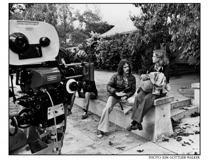 PHOTO: Kim Gottlieb-Walker | SouthPasadenan.com | John Carpenter and the soon-to-be-famous Jamie Lee Curtis on the steps of the “Strode House” across from the Library in March 1978—photo courtesy of Kim Gottlieb Walker from her book ‘On Set with John Carpenter: The Photographs of Kim Gottlieb-Walker’ available for checkout from the Library. Malek Akkad, owner of the Halloween Franchise has said, 