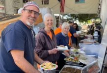 PHOTO: Sally Kilby | The South Pasadenan | Brant Dunlap, Mary Jane Juranek and Anita Scott take a break from working on the float to enjoy a taco salad lunch from Hi-Life.