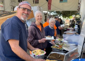 PHOTO: Sally Kilby | The South Pasadenan | Brant Dunlap, Mary Jane Juranek and Anita Scott take a break from working on the float to enjoy a taco salad lunch from Hi-Life.