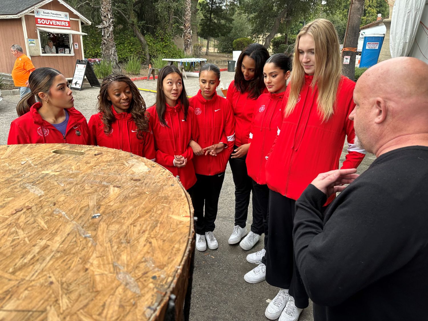 PHOTO: Bill Glazier | The South Pasadenan | South Pasadena Tournament of Roses Chair Ed Donnelly, right, tells the history of South Pasadena’s float to the 2024 Rose Court.